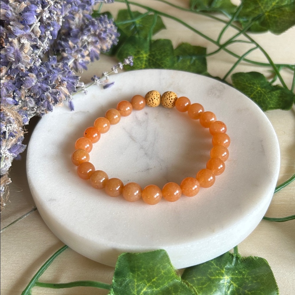 Sunset orange aventurine with lava stone oil infusible stretch gemstone bracelet